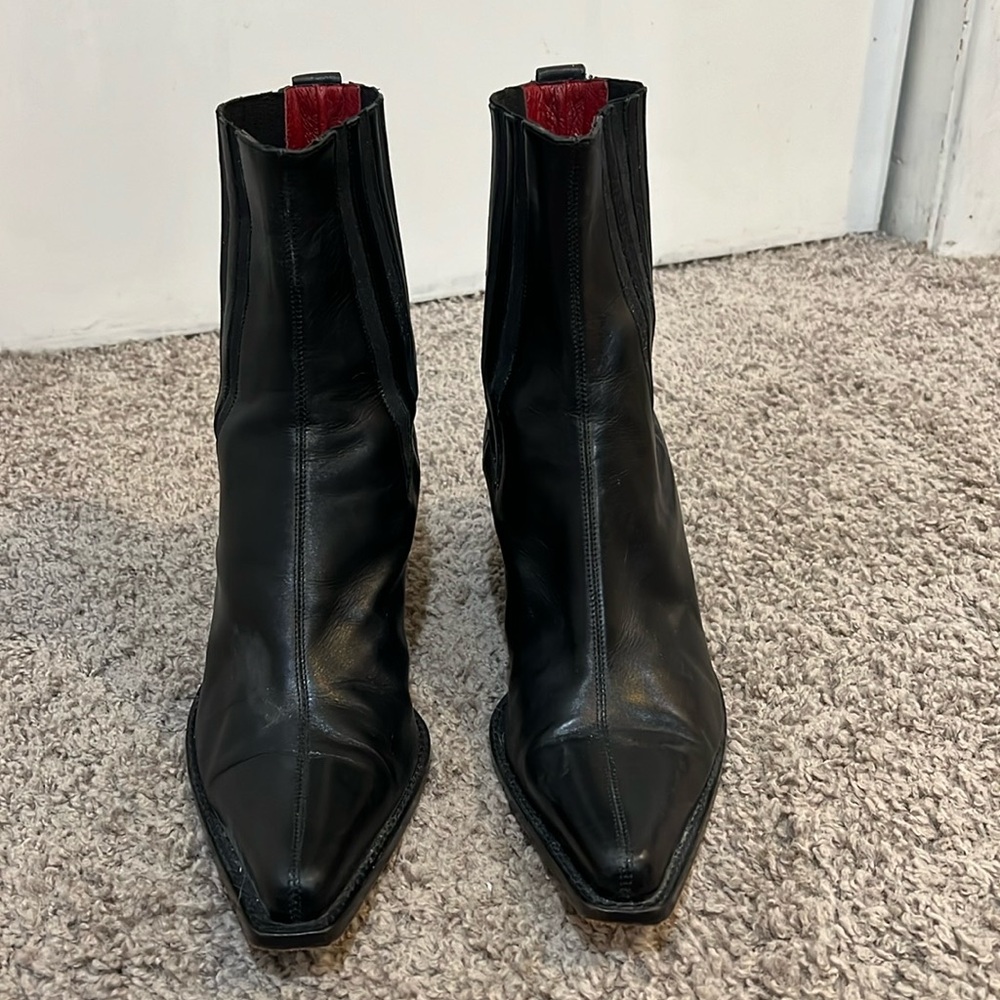 Black Donald J Pliner ankle boots.